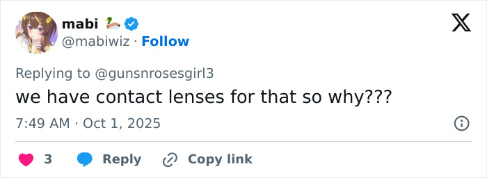Screenshot of a Twitter reply discussing eye color change surgery and mentioning contact lenses as an alternative option.