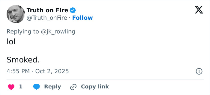 Tweet reply to J.K. Rowling with the word lol and smoked, showcasing reactions to closet lesbian bet claims.