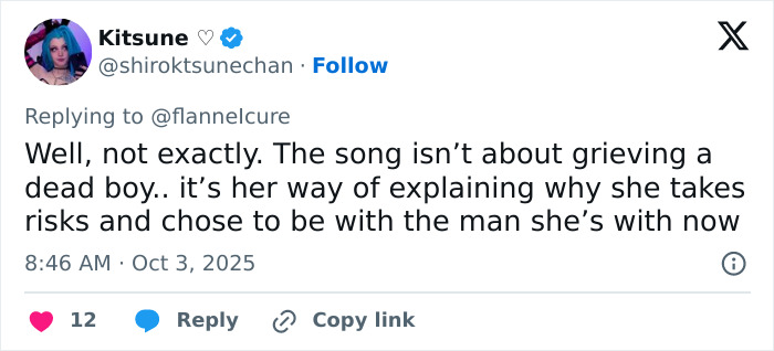 Screenshot of a Twitter reply discussing the meaning behind a Taylor Swift song related to friendship and relationships.