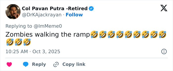 Tweet commenting on Paris Fashion Week with a humorous take mentioning zombies walking the ramp, related to Hunger Games.