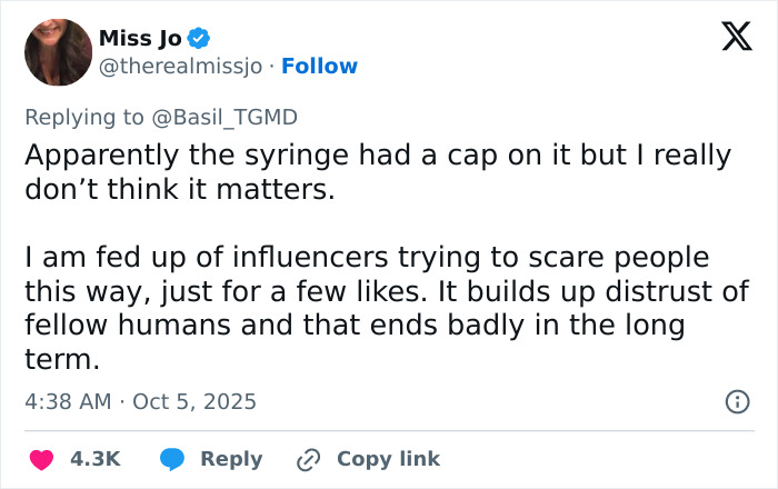Tweet criticizing influencer's fake syringe prank, expressing frustration over fear tactics and distrust caused by social media stunts.