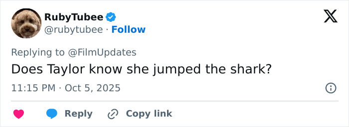 Twitter user RubyTubee replying to a tweet with a question about Taylor Swift and a music video secret jab.