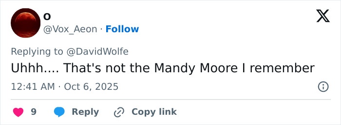 Screenshot of a social media reply expressing disbelief at Mandy Moore&rsquo;s unrecognizable new look and appearance change.