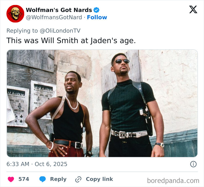 Two men posing outdoors, one wearing sunglasses and black shirt, illustrating Jaden Smith red-faced diaper look trolling in Paris. Two men posing outdoors, one wearing sunglasses and black shirt, illustrating Jaden Smith red-faced diaper look trolling in Paris.