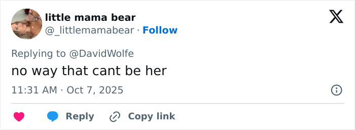 Twitter reply screenshot from user little mama bear expressing disbelief, reacting to Mandy Moore's unrecognizable new look.