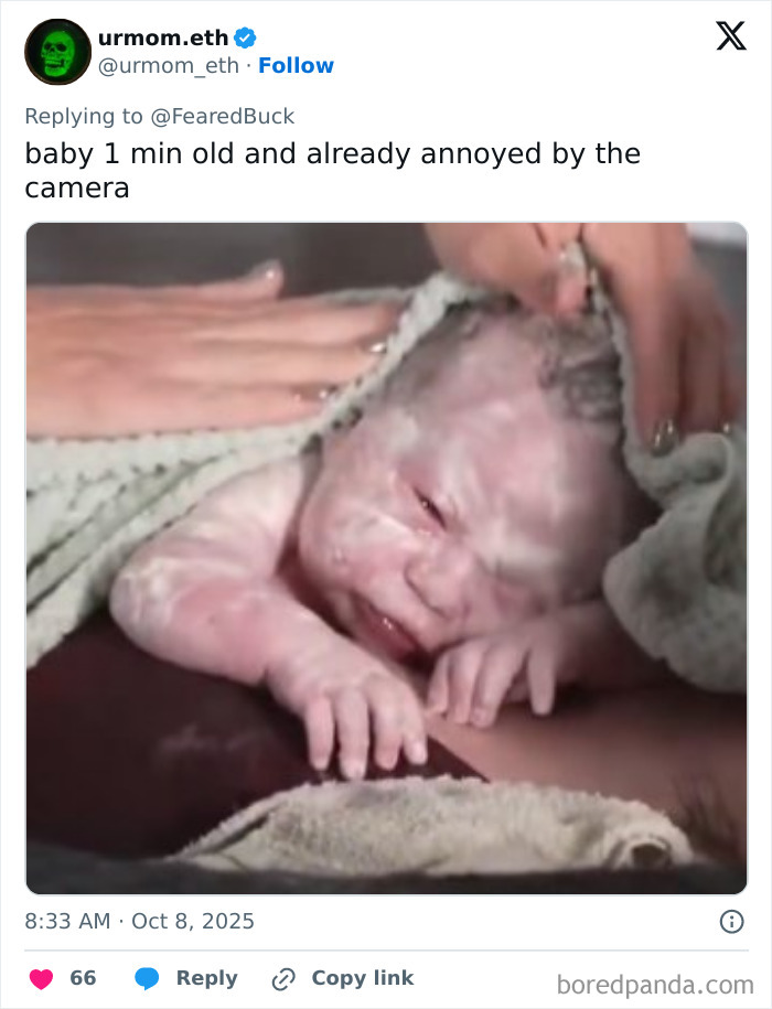 Newborn baby wrapped in a towel moments after birth, sparking debate about woman giving birth on Twitch livestream.