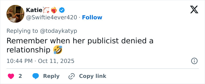 Katy Perry and shirtless Justin Trudeau sitting closely together on a yacht in steamy candid photos.