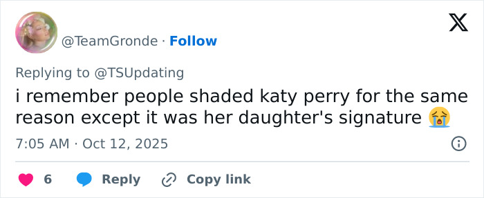 Tweet discussing Travis Kelce autograph controversy with Taylor Swift fans and mention of tradwife keyword.