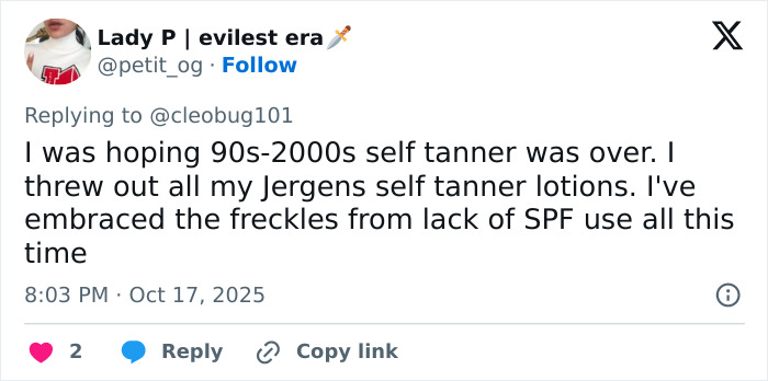 Tweet about personal views on fake tan trends, mentioning self-tanner use and embracing natural freckles instead.