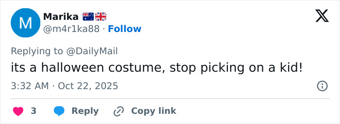 Screenshot of a tweet defending North West&rsquo;s Halloween costume with fake face tattoos, piercings, and grills.