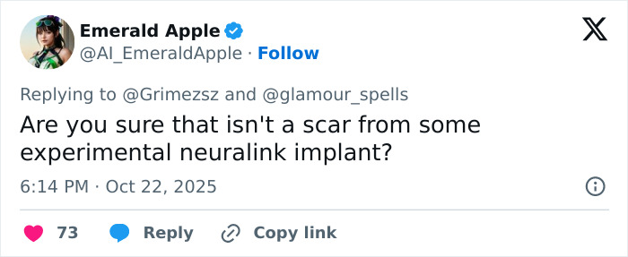 Tweet from Emerald Apple questioning if Elon Musk's ex Grimes face tattoo is a scar from Neuralink implant, sparking fan debates.