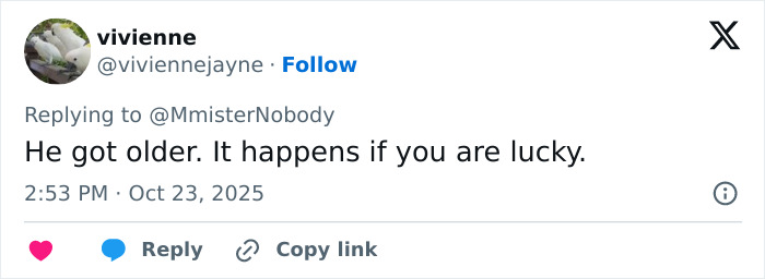 Twitter reply from user viviennejayn discussing Bradley Cooper's radical makeover and fans comparing him to Barry Manilow.