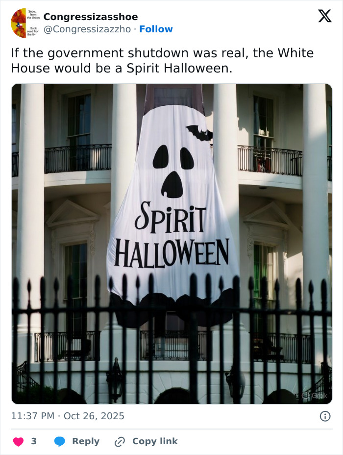 Large ghost decoration with Spirit Halloween logo hangs in front of White House, relating to Melania Trump's Halloween display roast.