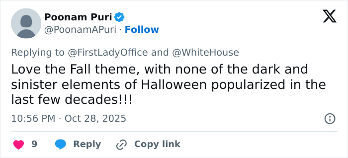 Screenshot of a social media reply commenting on Melania Trump's White House Halloween display with a fall theme.
