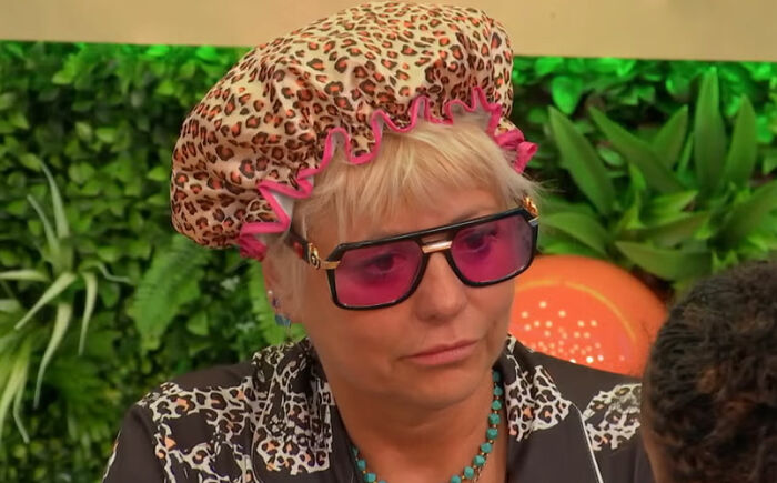 Big Brother housemate wearing leopard print and pink glasses during one of the most uncomfortable moments in 23 years.