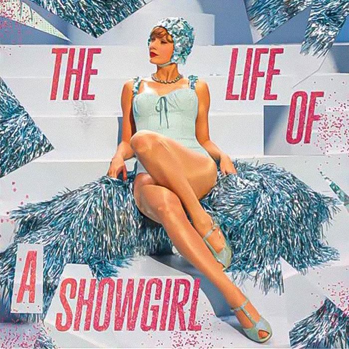 Taylor Swift in vintage swimwear posing with metallic pom-poms highlighting tradwife and fan reactions.