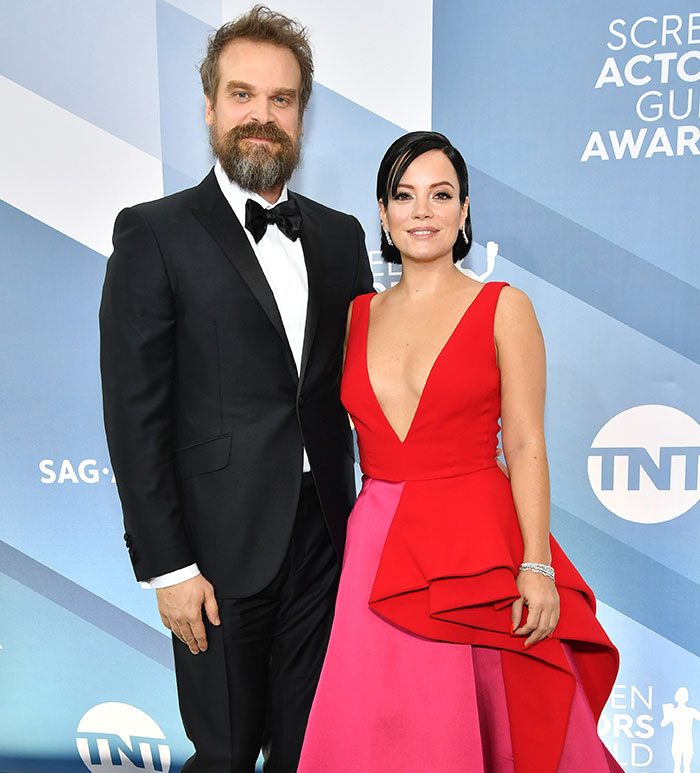 David Harbour and his friend posing on the red carpet at the Screen Actors Guild Awards event.