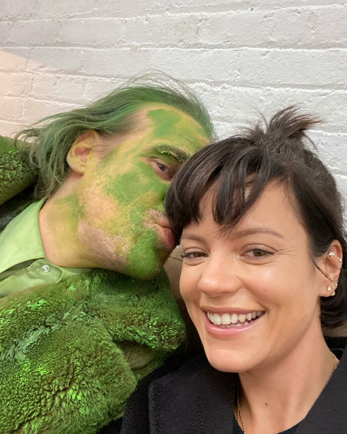 Man with green face paint and woman smiling together, related to mystery woman at center of cheating rumors revealed.
