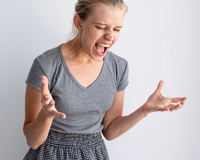 Woman expressing anger and frustration over family drama involving a bizarre fake adoption plan.