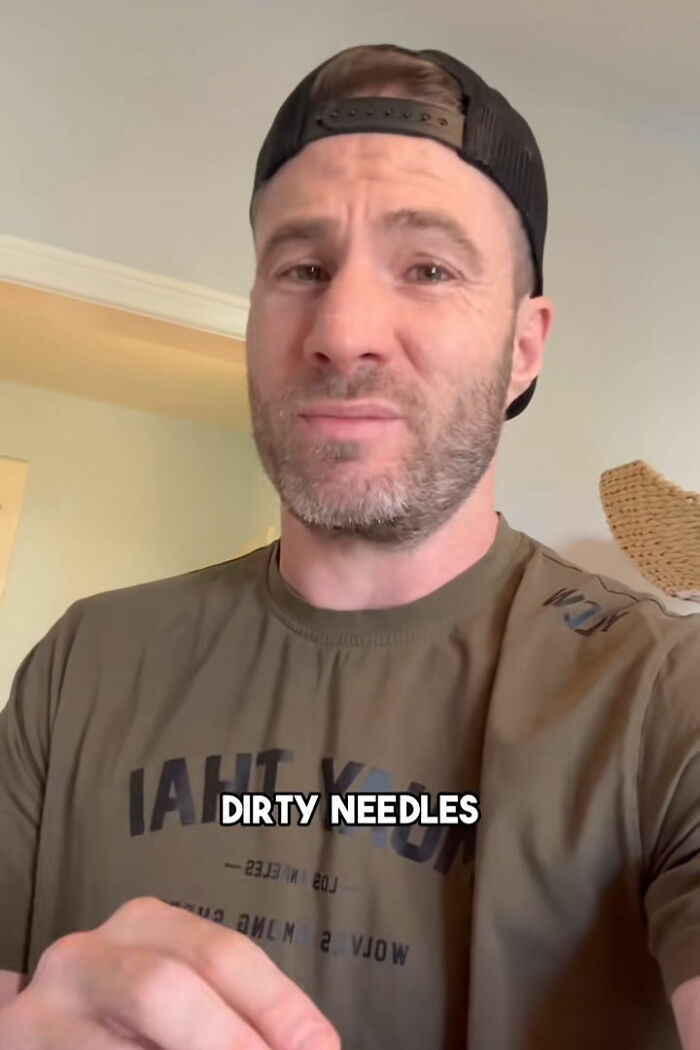 Man in a backward cap warning about toilet paper danger related to dirty needles in public bathrooms.