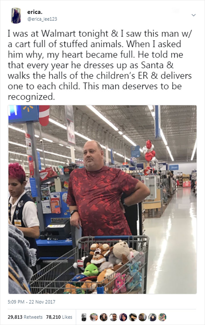 Man at Walmart with a cart full of stuffed animals, known for dressing as Santa and giving toys to children annually.