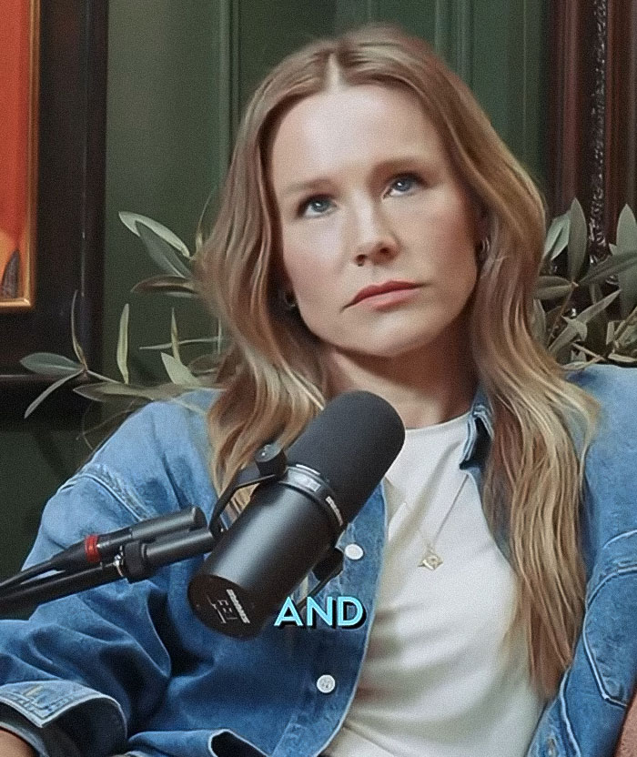 Kristen Bell speaking into a microphone during a podcast, facing backlash from experts over triggering behavior.
