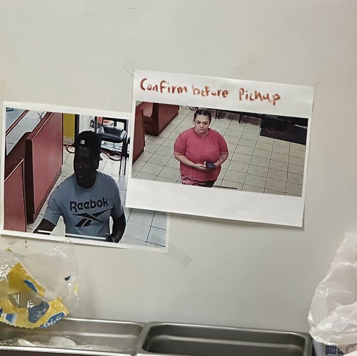 Photos of two restaurant customers taped on a wall above a sink, related to restaurant staff stories about unpaid bills.