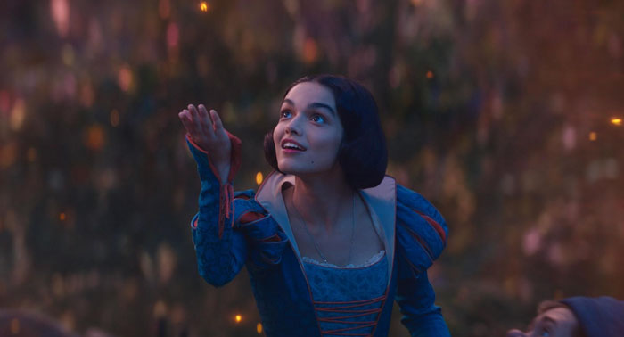 Young woman in period costume reaching out, representing Disney casting white actress in controversial reboot news. Young woman in period costume reaching out, representing Disney casting white actress in controversial reboot news.
