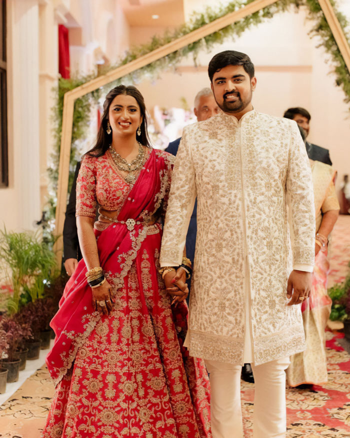 Couple in traditional attire at wedding ceremony representing doctor who argued against wife&rsquo;s autopsy after sudden passing.