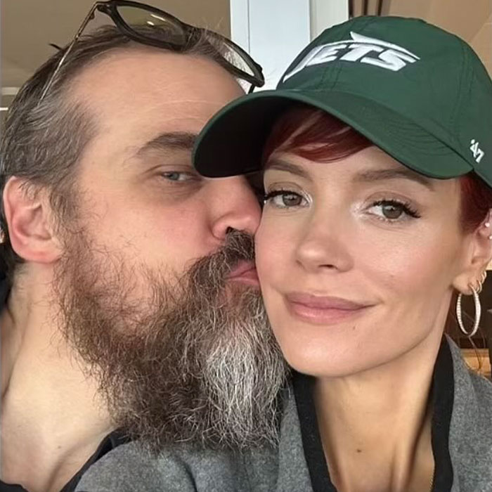 Couple sharing an intimate moment with a bearded man kissing a woman in a green hat, linked to Lily Allen album and cheating claims.