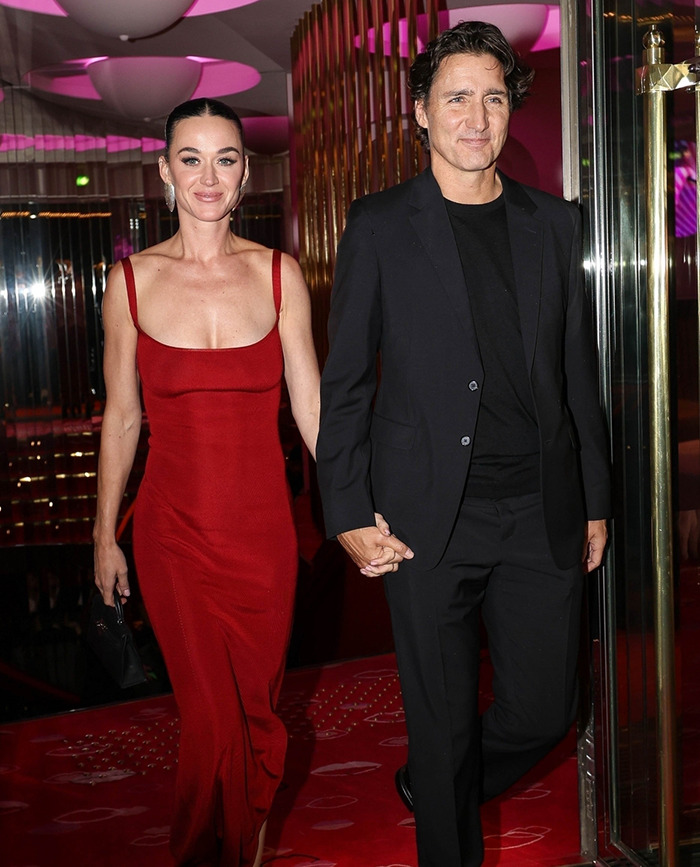 Katy Perry and Justin Trudeau holding hands at a formal event, sparking rumors about their romance and exes. Katy Perry and Justin Trudeau holding hands at a formal event, sparking rumors about their romance and exes.