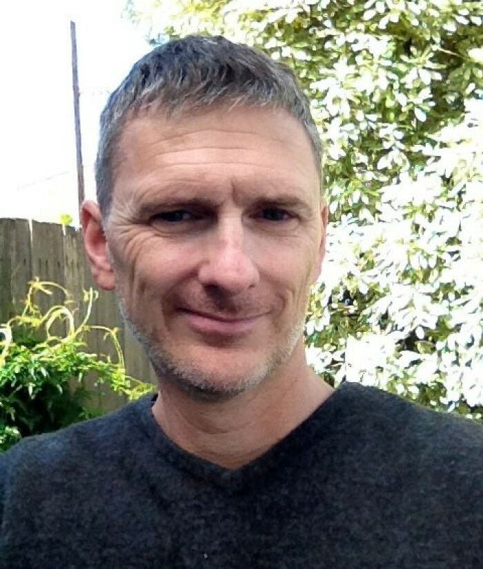 Middle-aged man outdoors with short gray hair, wearing a dark sweater, representing TV star facing capital punishment in China. Middle-aged man outdoors with short gray hair, wearing a dark sweater, representing TV star facing capital punishment in China.