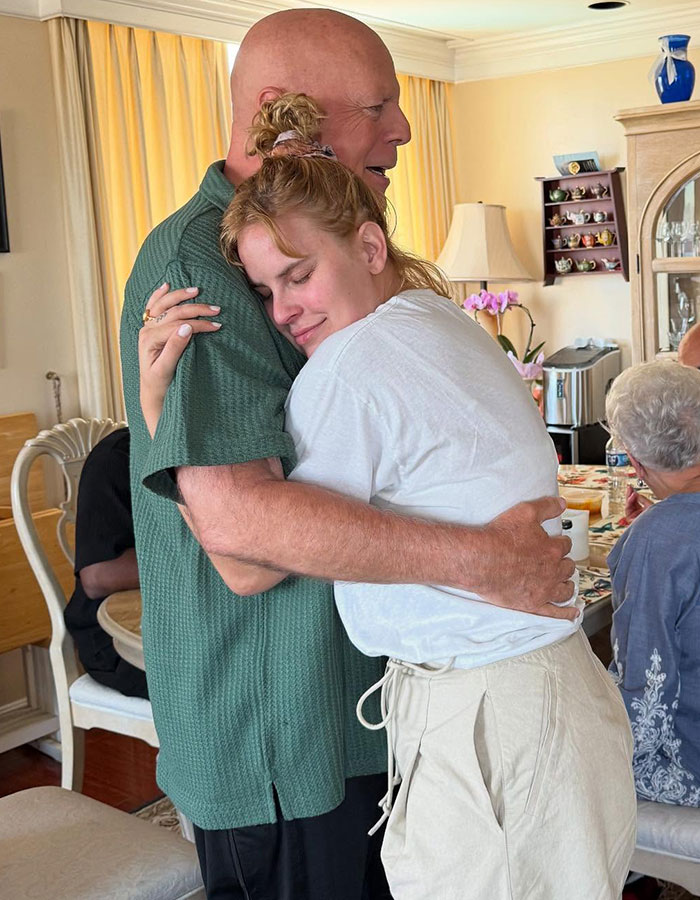 Bruce Willis hugging his daughter as she shows emotion amid comments from Perez Hilton about her teen years. Bruce Willis hugging his daughter as she shows emotion amid comments from Perez Hilton about her teen years.