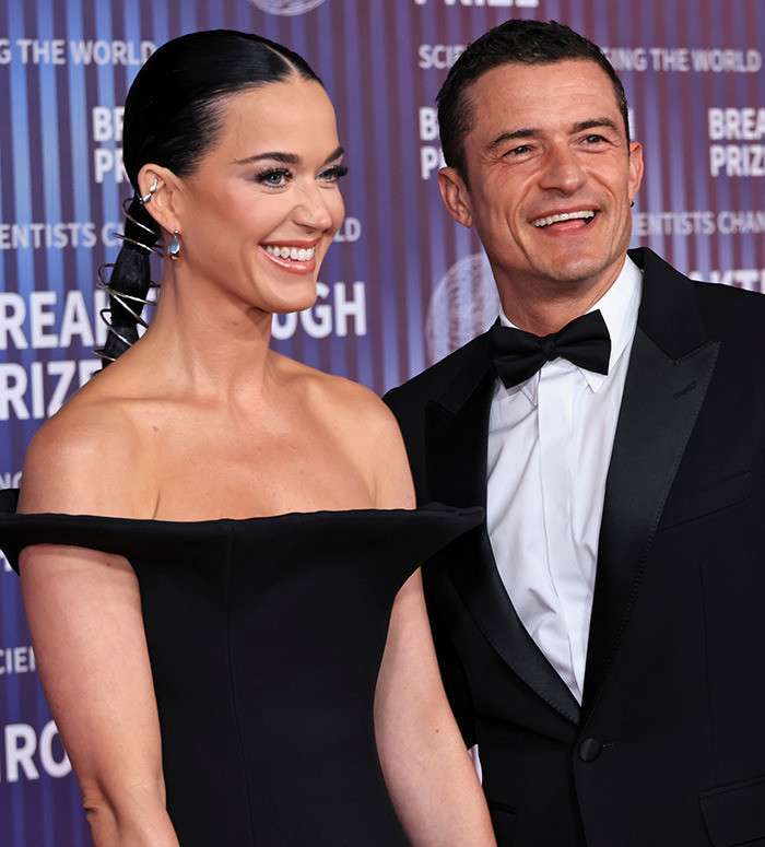 Katy Perry and Justin Trudeau smiling together on the red carpet amid claims their romance is a jab at exes. Katy Perry and Justin Trudeau smiling together on the red carpet amid claims their romance is a jab at exes.