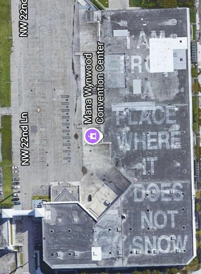 Aerial view of rooftop text captured by Google Earth and Maps showing a hidden message at Mana Wynwood Convention Center.