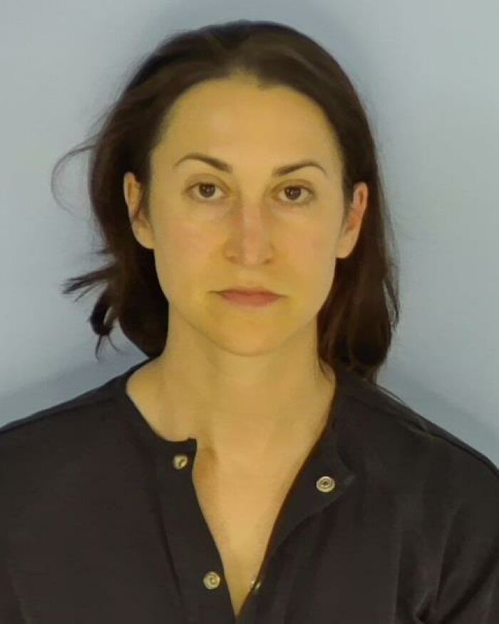 Healthcare exec with serious expression in a dark shirt, related to baby left alone at the beach controversy. Healthcare exec with serious expression in a dark shirt, related to baby left alone at the beach controversy.