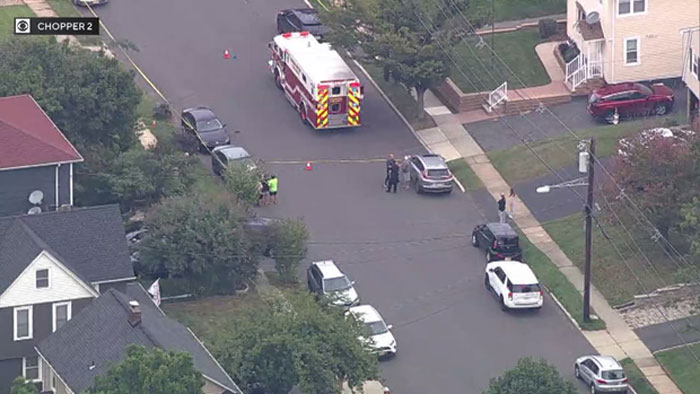 Aerial view of emergency responders and vehicles at the scene of a hit-and-run involving a teen driver.