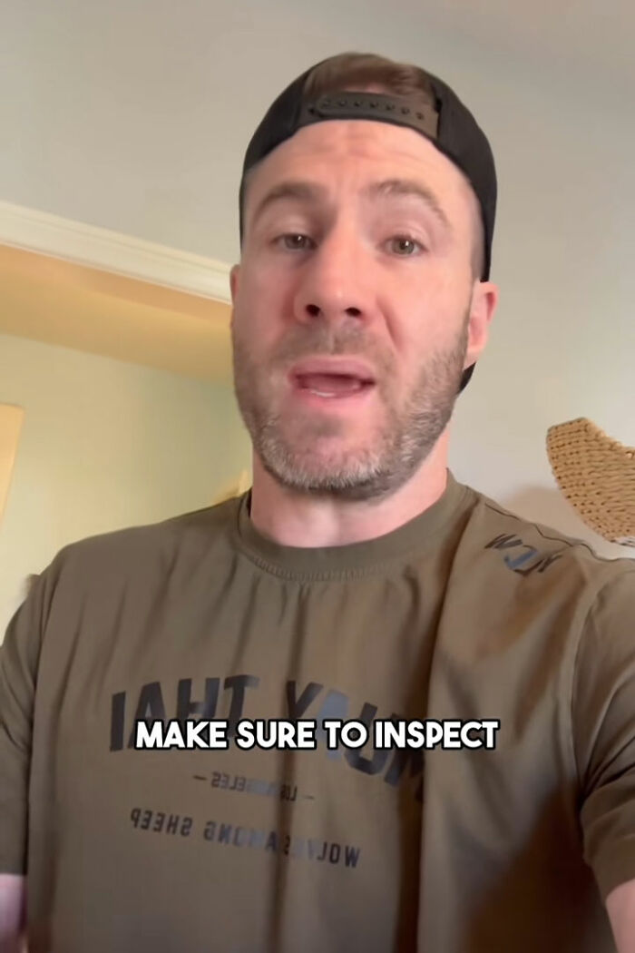 Man wearing a backward cap explaining toilet paper danger in public bathrooms with text overlay saying make sure to inspect