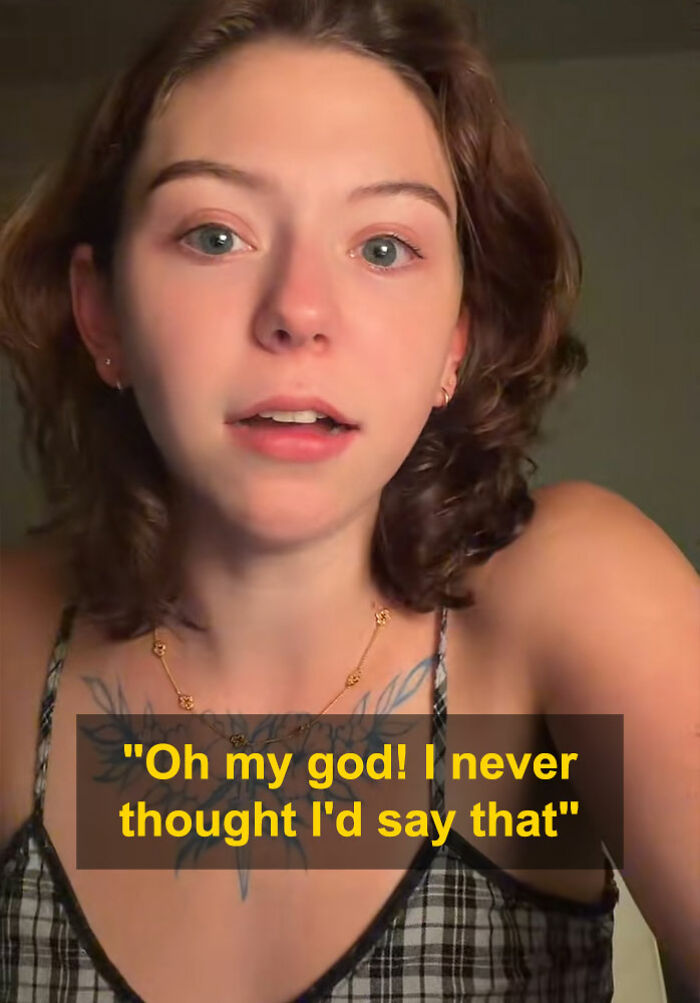 Young woman with short hair reacting in video after removing nose ring due to comments about looking like a Democrat.