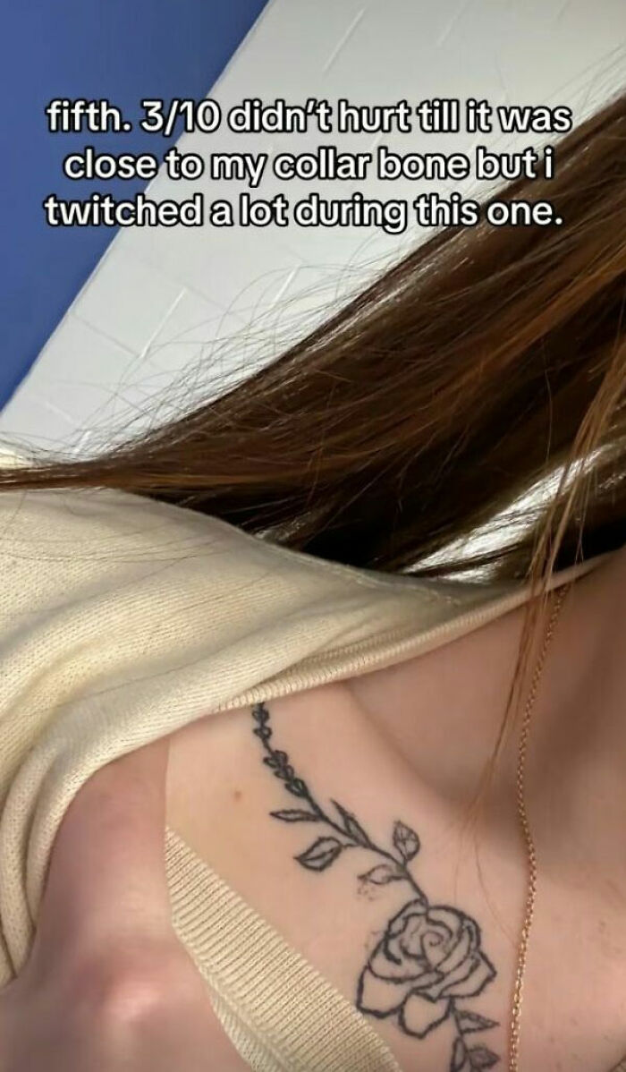 Close-up of a delicate rose tattoo on collar bone with text describing tattoo pain and twitching sensation.