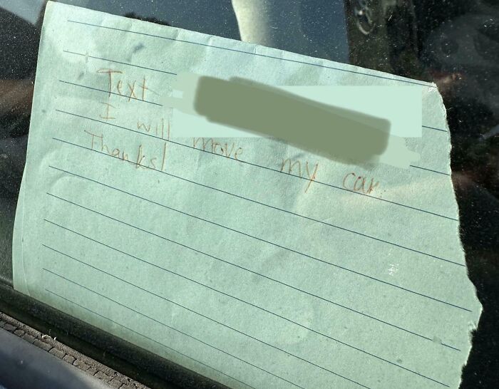 Note on a car window with handwriting, illustrating people apparently allergic to acting like sensible adults.