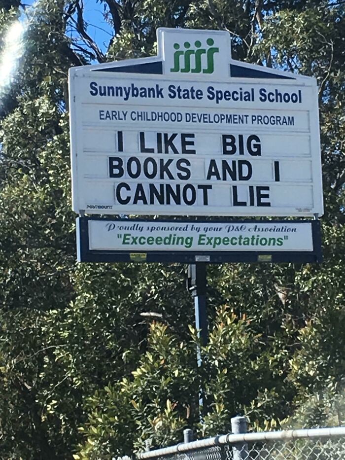 Funny and weird billboard at Sunnybank State Special School reading I like big books and I cannot lie in bright daylight.