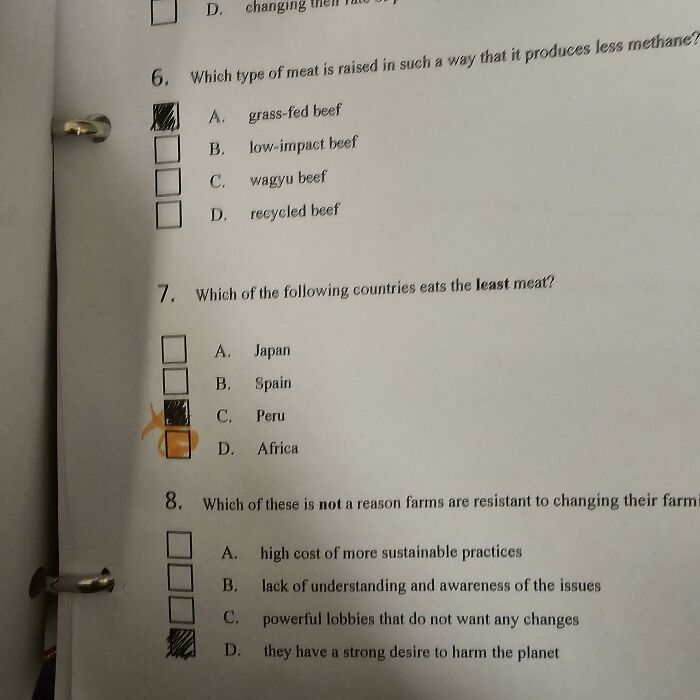 Scantron sheet with multiple-choice questions showing incorrectly marked answers, illustrating mildly infuriating test mistakes.