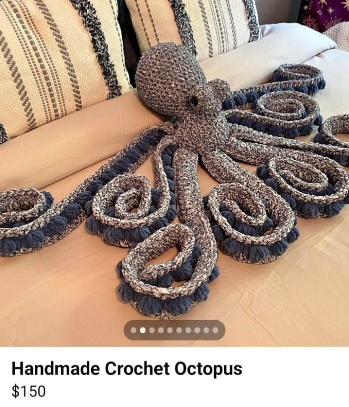 Handmade crochet octopus on beige couch, one of the weirdest purchases people would make in a heartbeat.