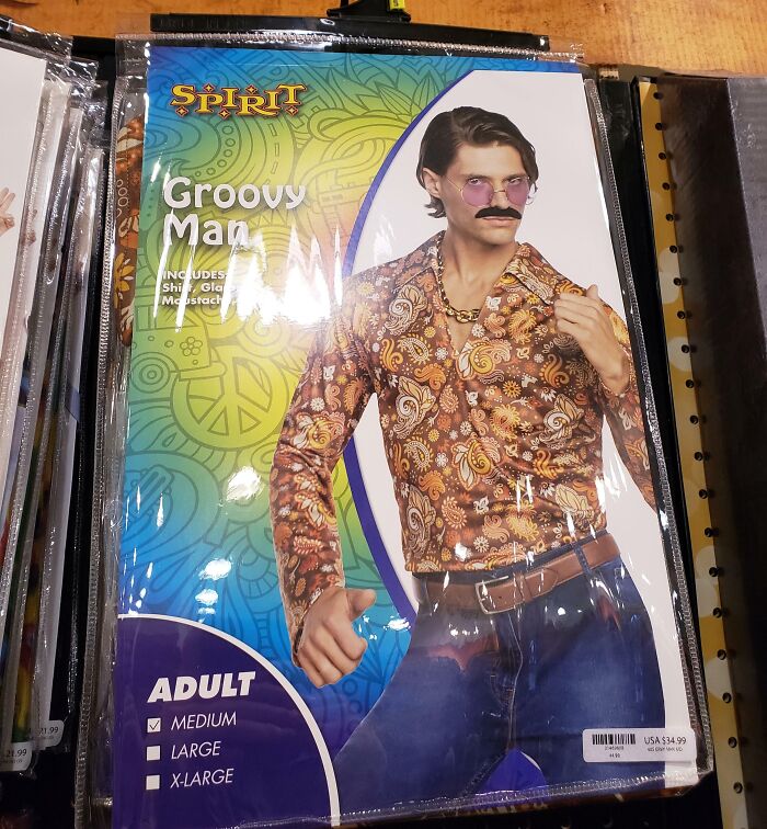 Off-brand Halloween costume packaging featuring a groovy man outfit with shirt, glasses, and mustache for adults.