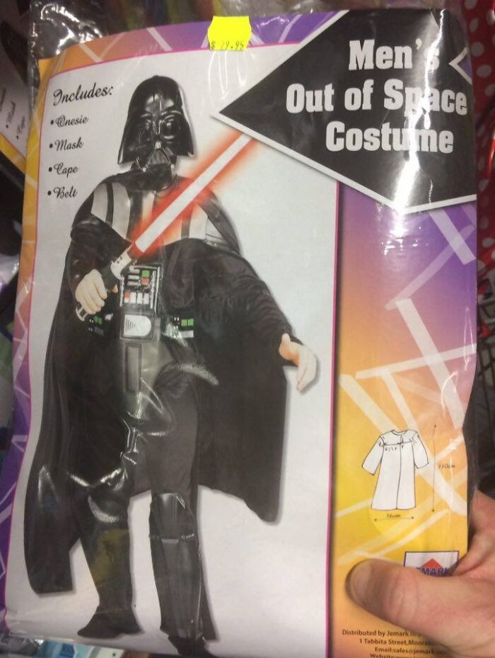 Off-brand Halloween costume labeled Men’s Out of Space featuring a dark helmet, cape, and light-up sword prop.