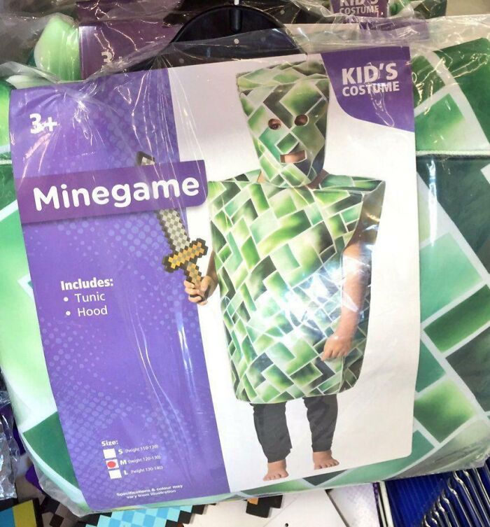 Off-brand Halloween costume for kids called Minegame with pixelated green tunic and hood holding a pixelated sword.