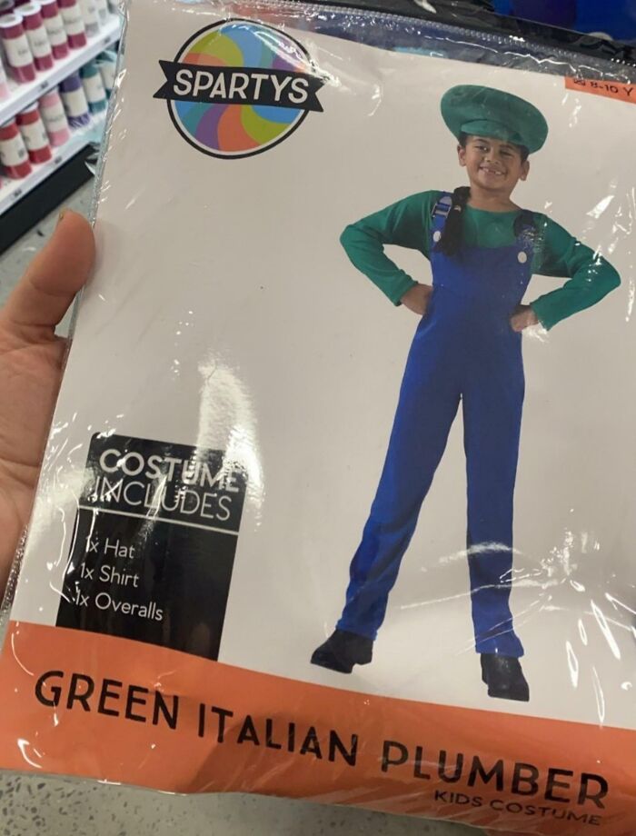Off-brand Halloween costume of green Italian plumber with hat, shirt, and overalls in packaging.