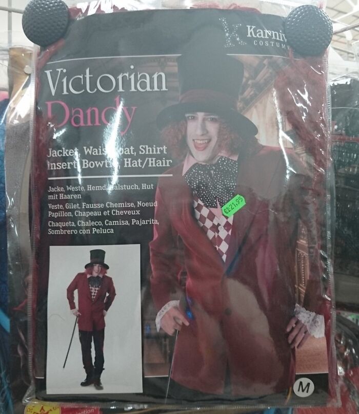 Off-brand Victorian Dandy Halloween costume with jacket, waistcoat, bow tie, and top hat in a plastic package.