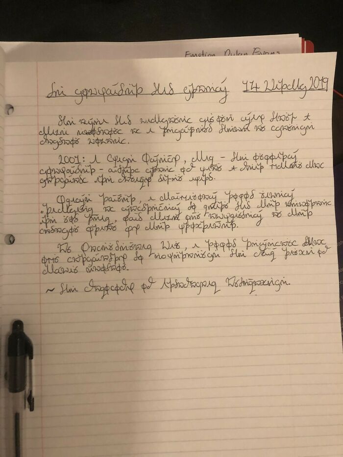 Handwritten notes on lined paper with a pen attached, showcasing a child's detailed invention ideas and creativity.